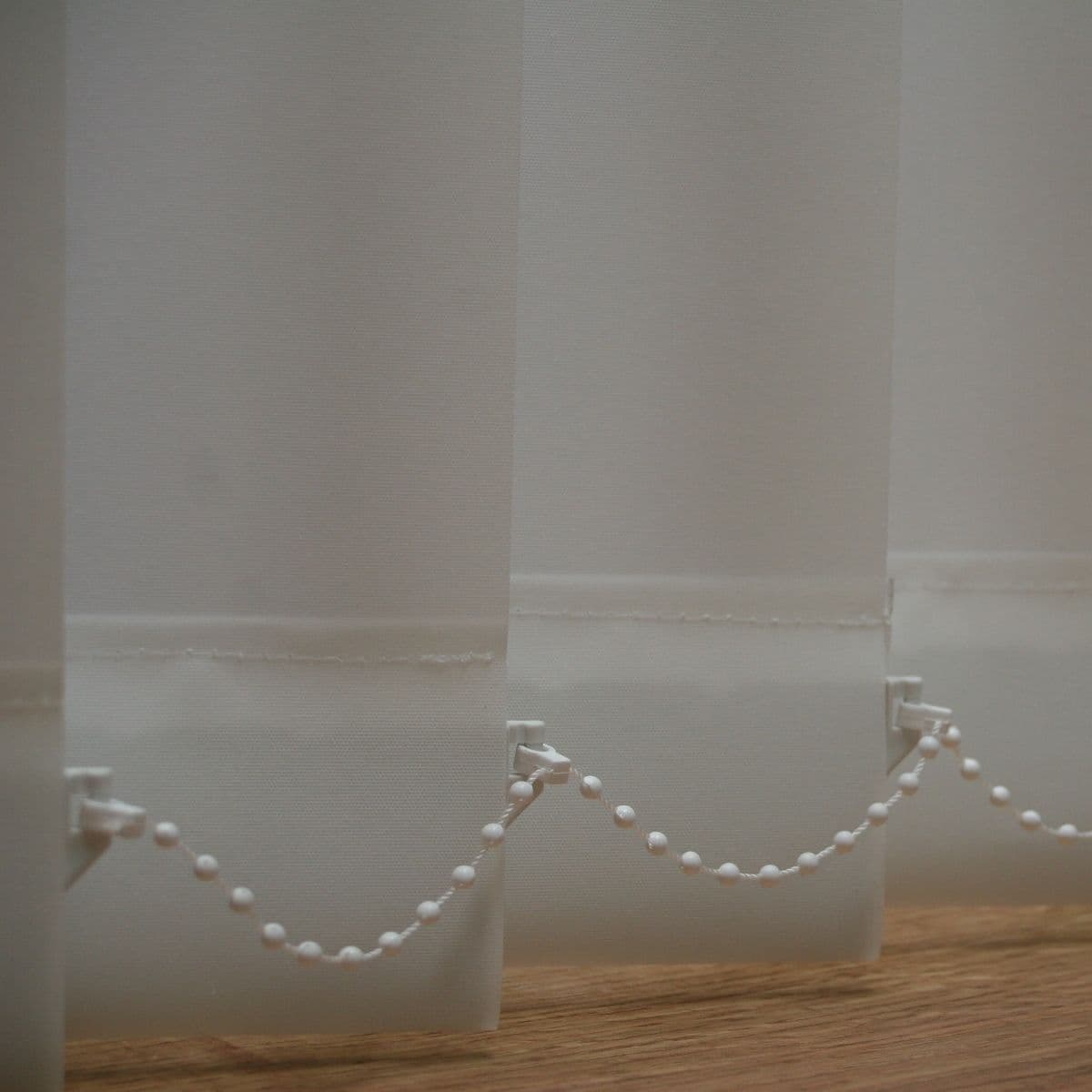 Made to measure vertical blinds in Bella Snow White plain blackout fabric